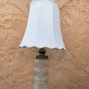 Classy glass lamp and shade.